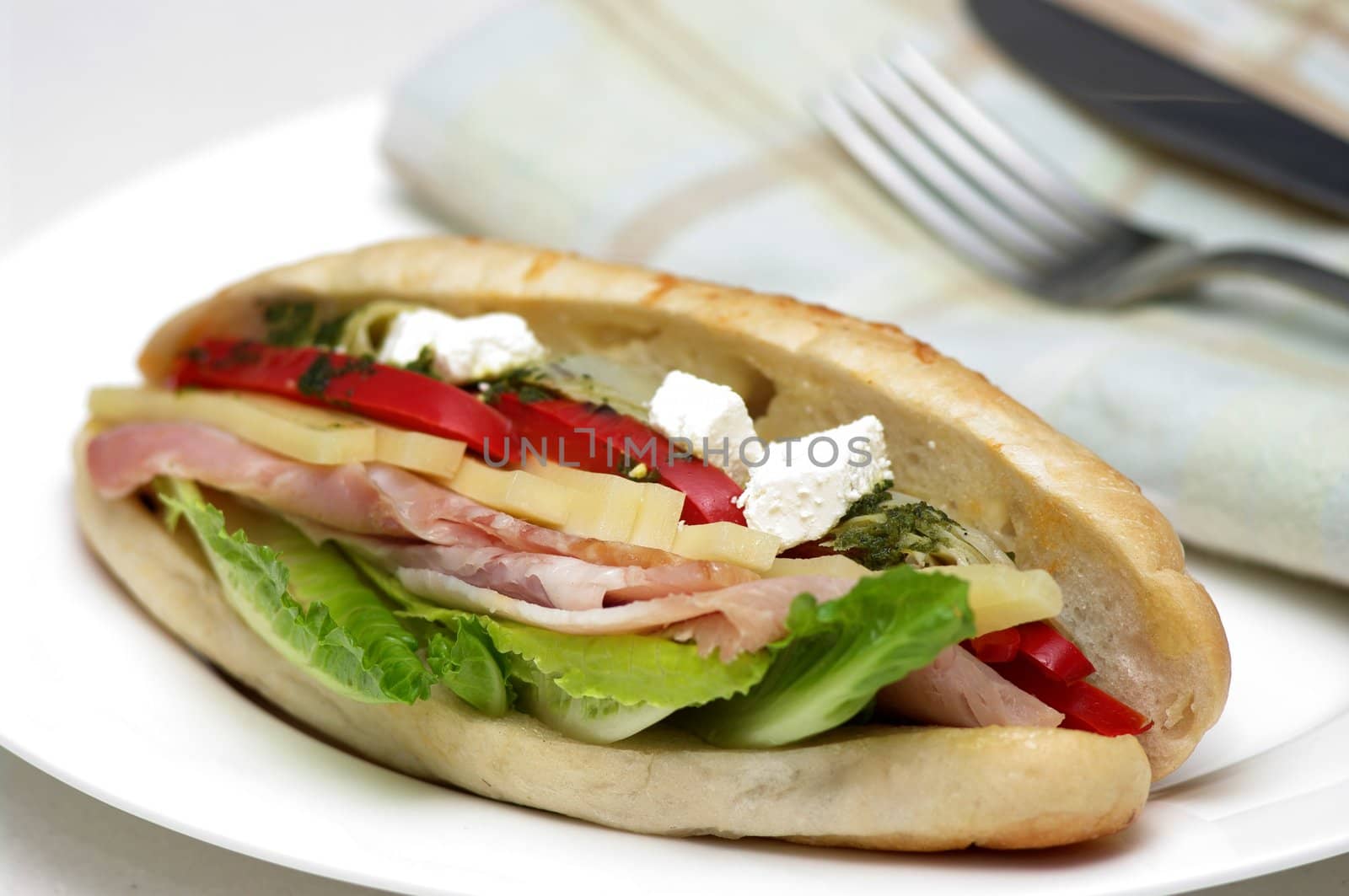 A delicious sandwich, bursting with fresh, healthy ingredients
