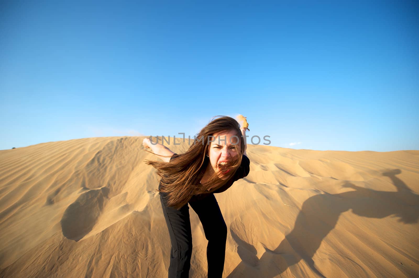 Woman enjoying the desert in Dubai, United Arab Emirates