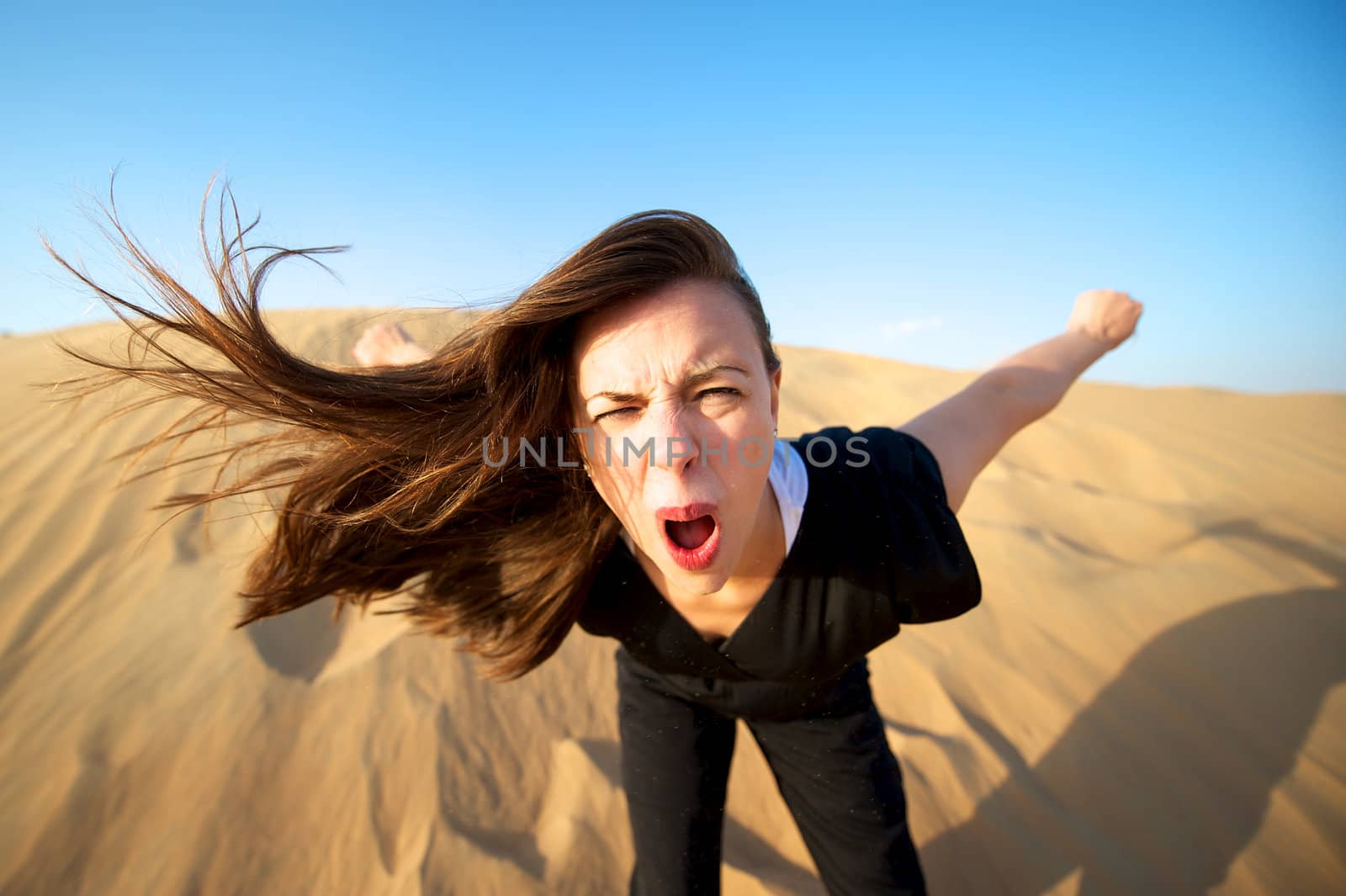 Woman enjoying the desert in Dubai, United Arab Emirates