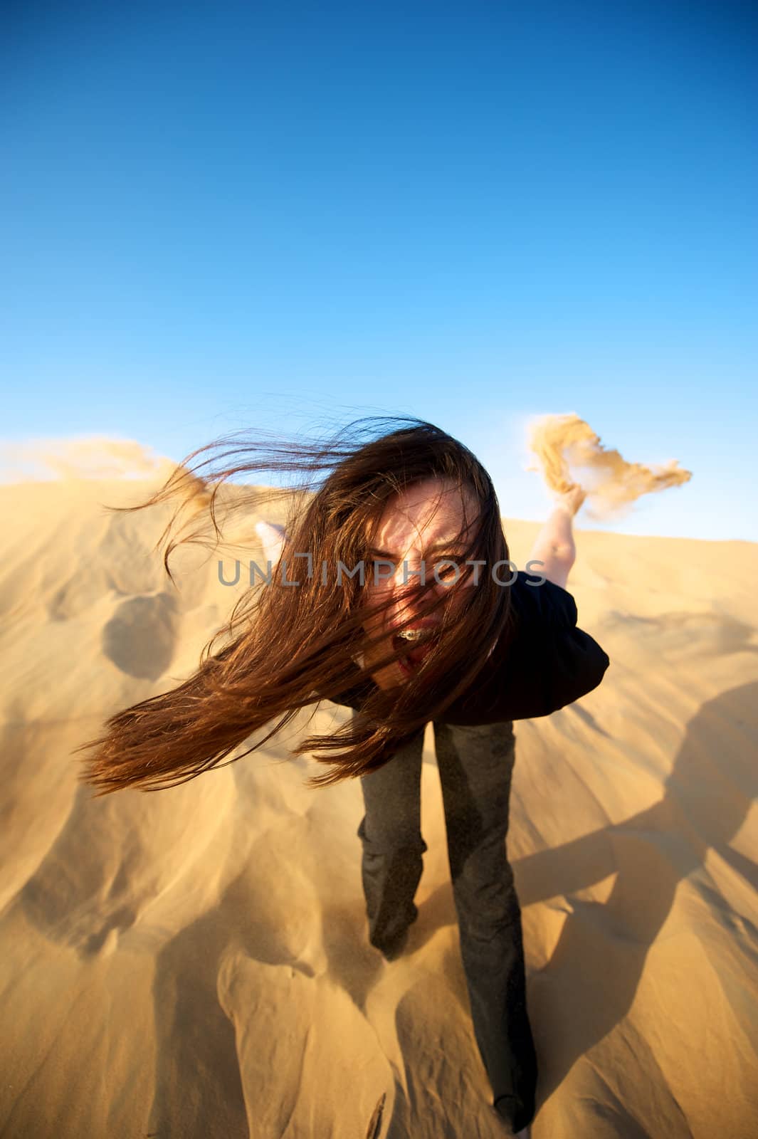 Woman enjoying the desert in Dubai, United Arab Emirates