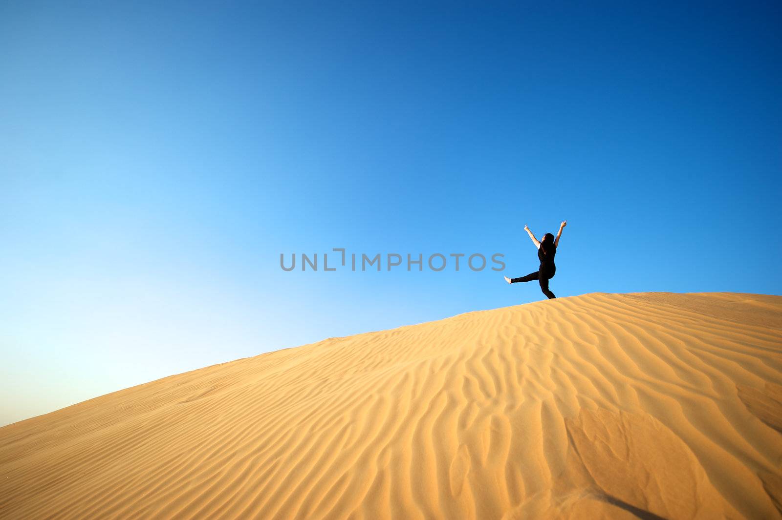 Woman in the desert by swimnews