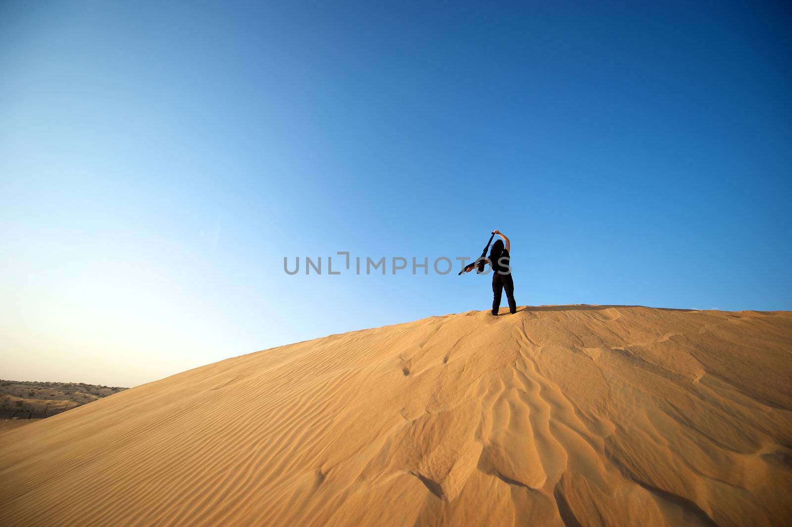 Woman enjoying the desert in Dubai, United Arab Emirates