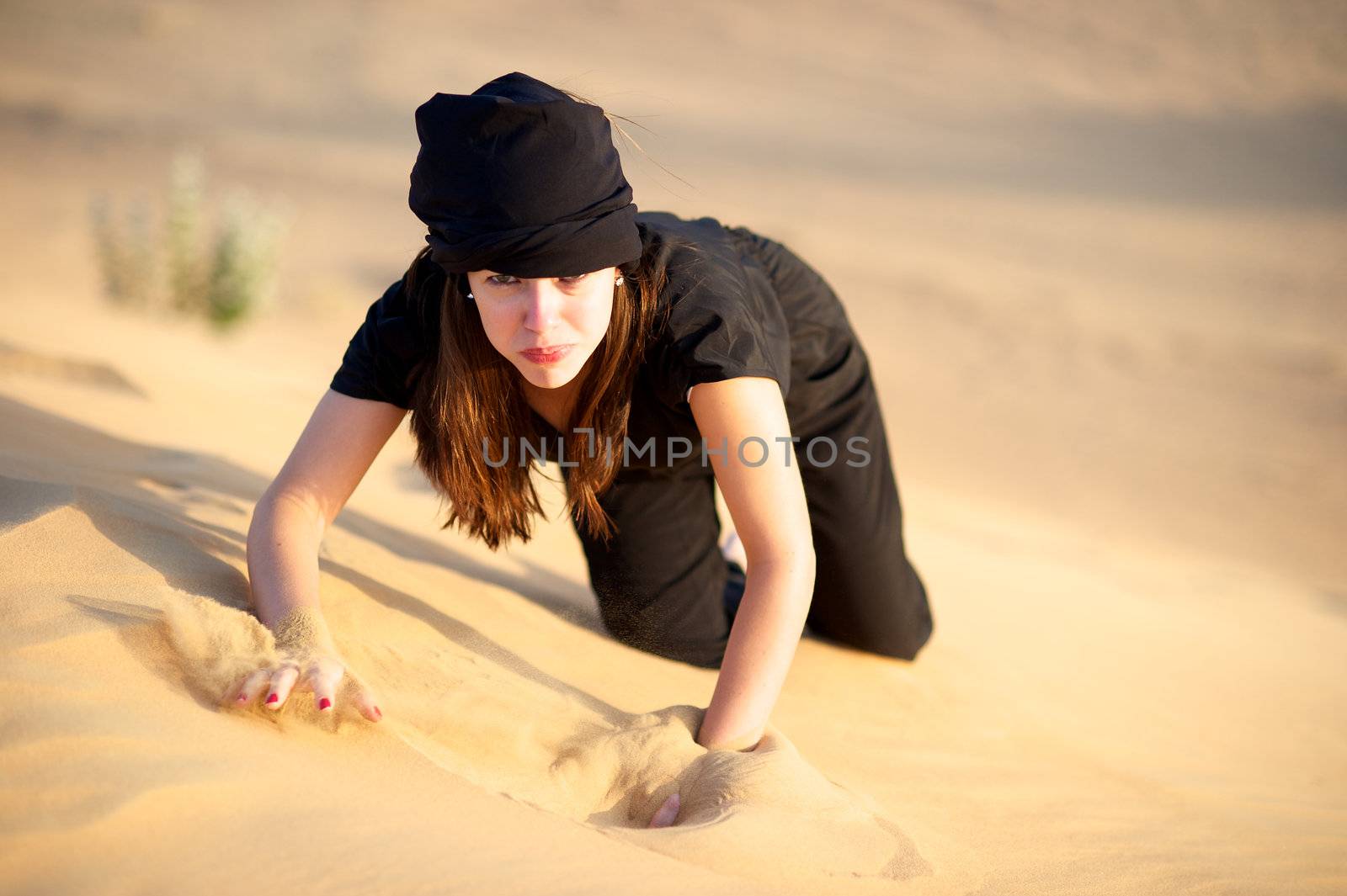 Woman enjoying the desert in Dubai, United Arab Emirates