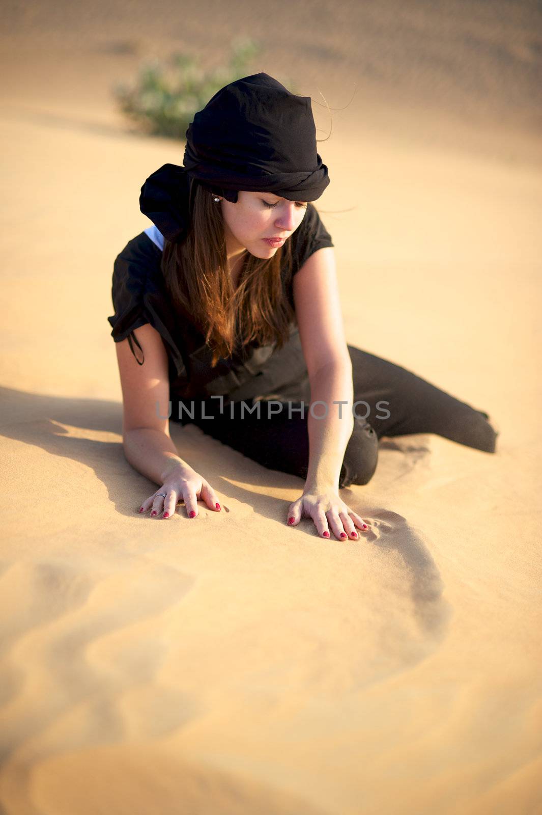 Woman enjoying the desert in Dubai, United Arab Emirates