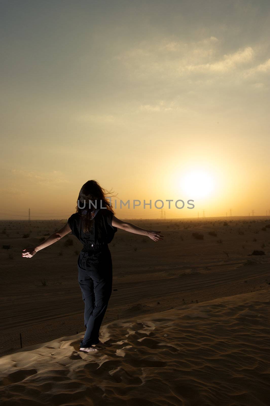Woman in the desert by swimnews
