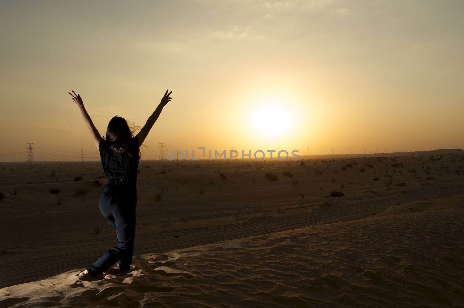 Woman enjoying the desert in Dubai, United Arab Emirates