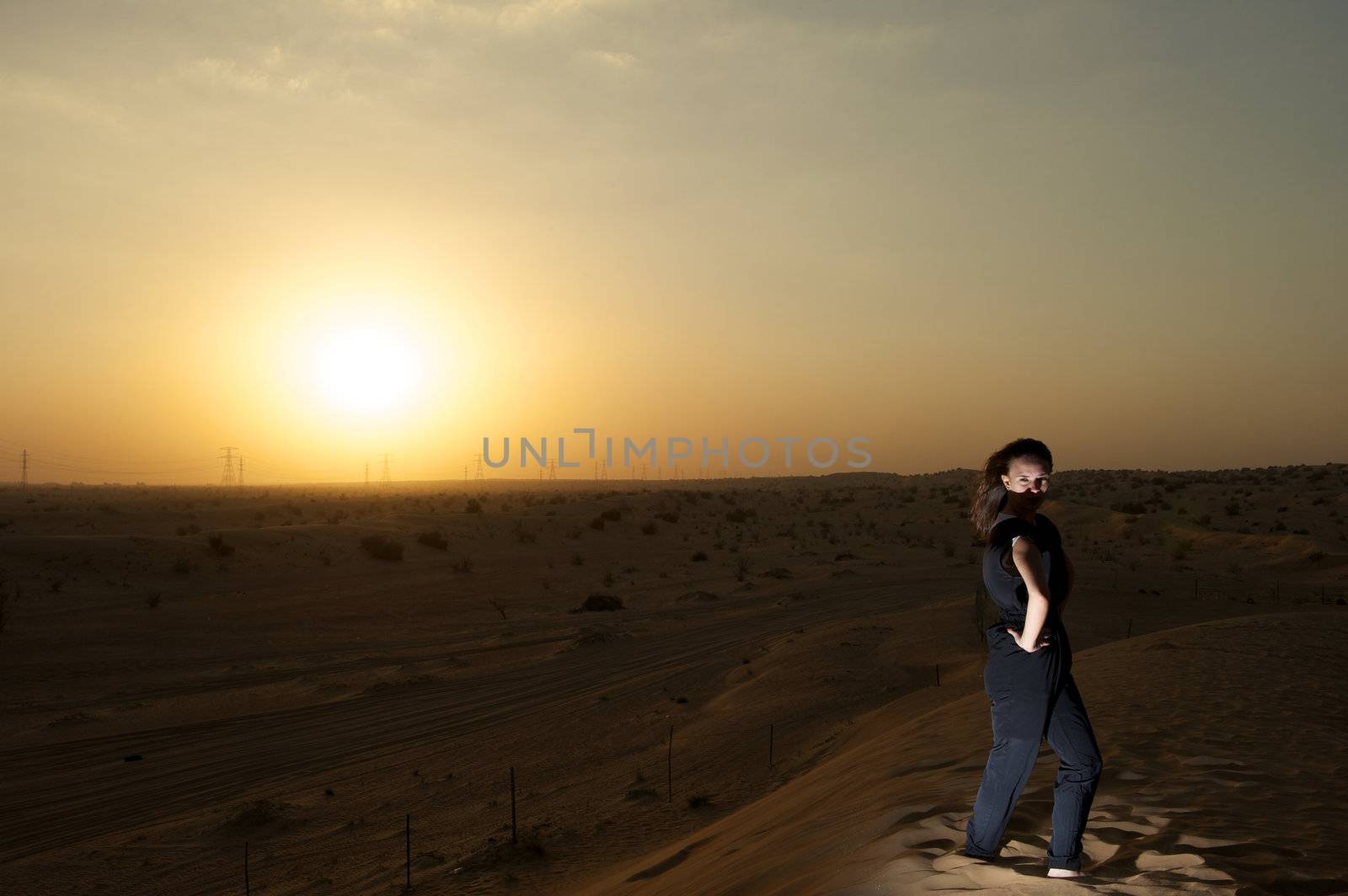 Woman enjoying the desert in Dubai, United Arab Emirates