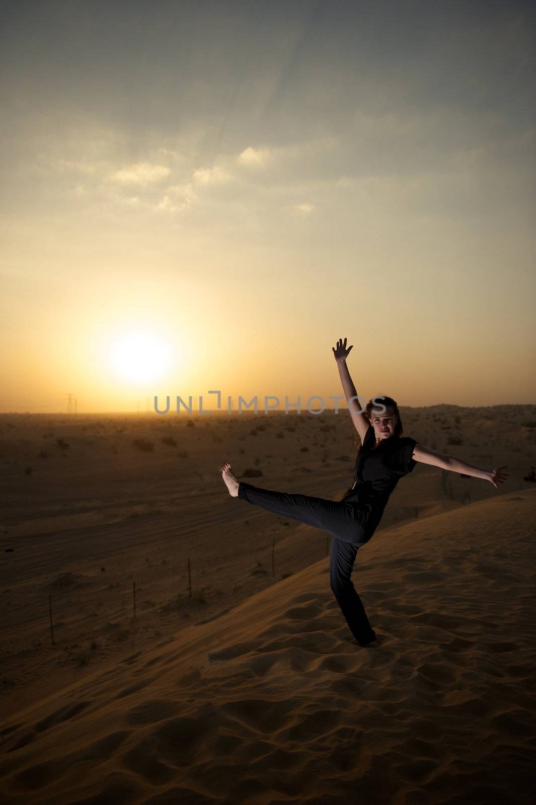 Woman enjoying the desert in Dubai, United Arab Emirates