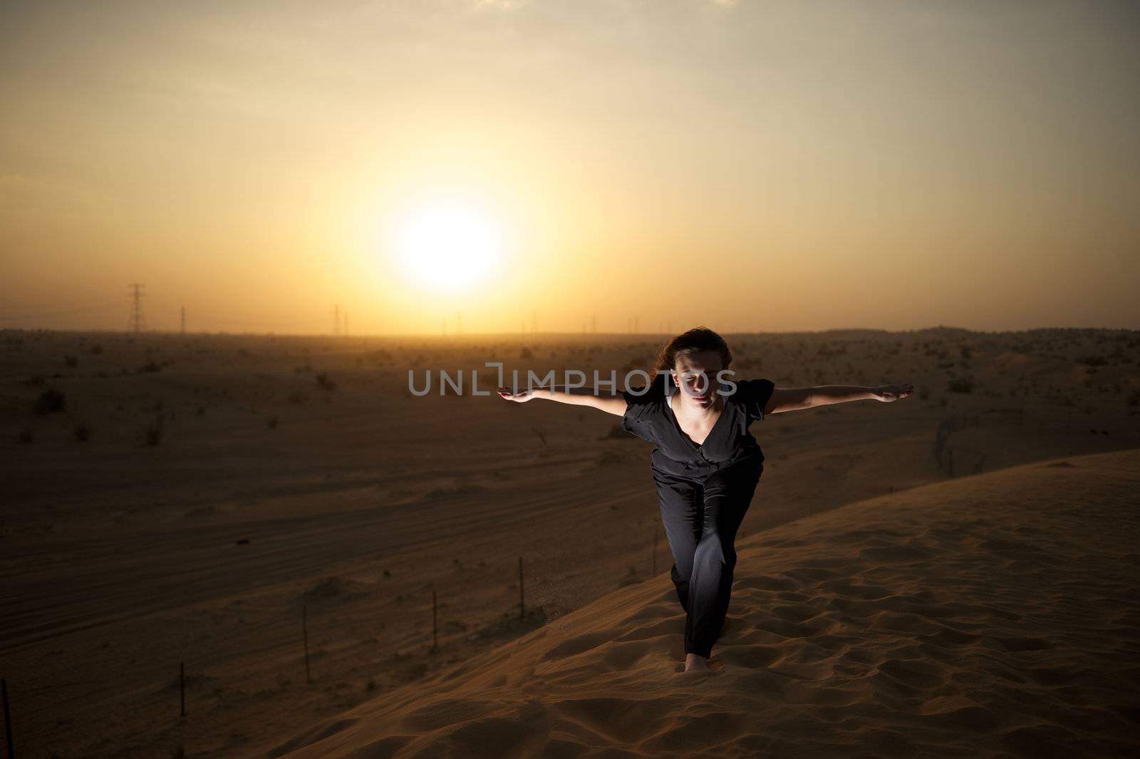 Woman enjoying the desert in Dubai, United Arab Emirates