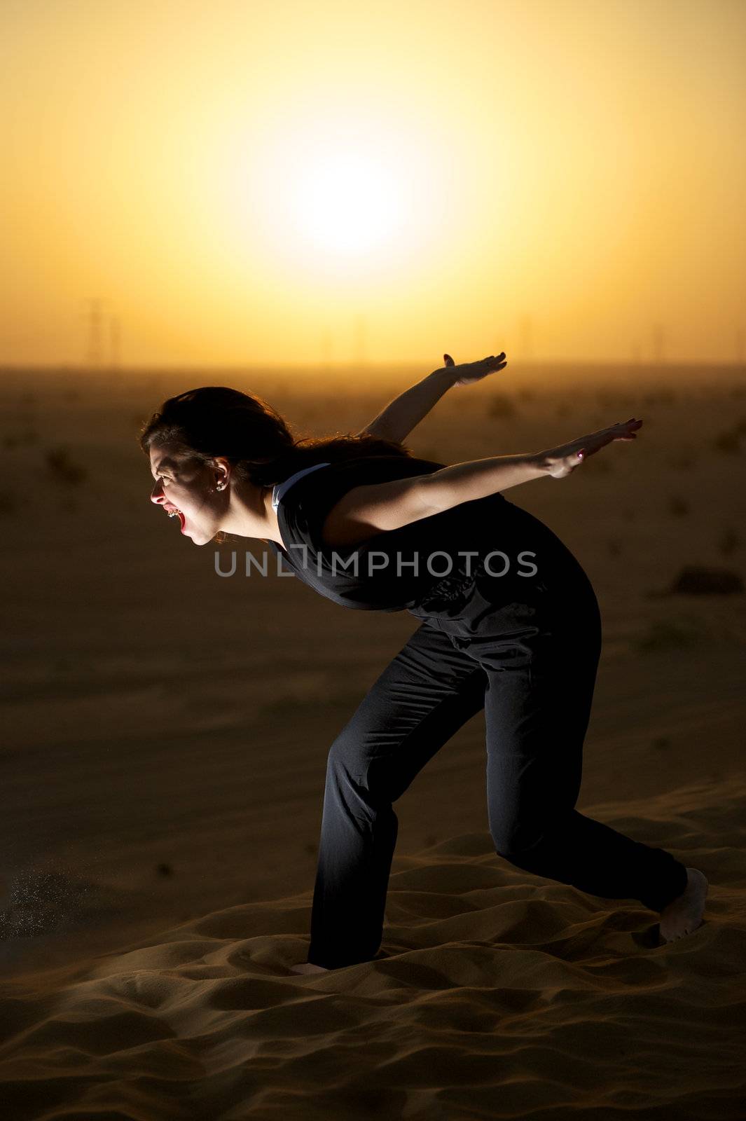 Woman enjoying the desert in Dubai, United Arab Emirates