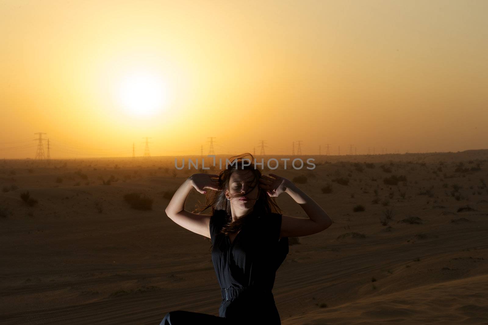 Woman enjoying the desert in Dubai, United Arab Emirates