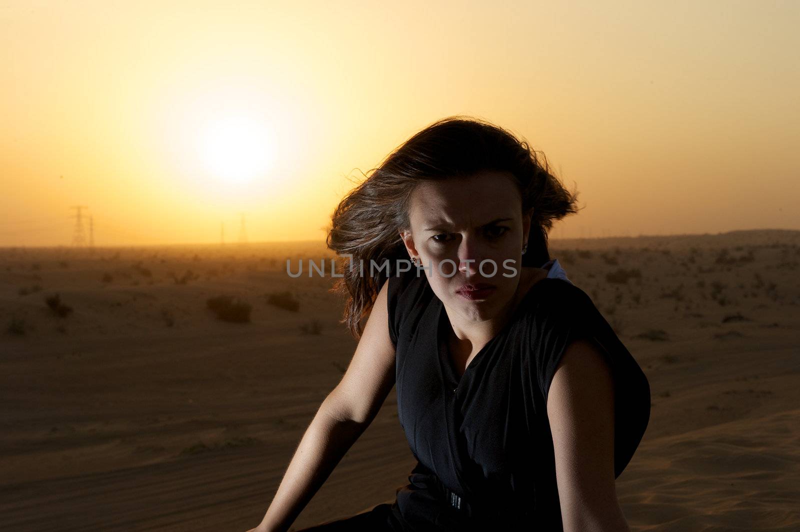 Woman enjoying the desert in Dubai, United Arab Emirates