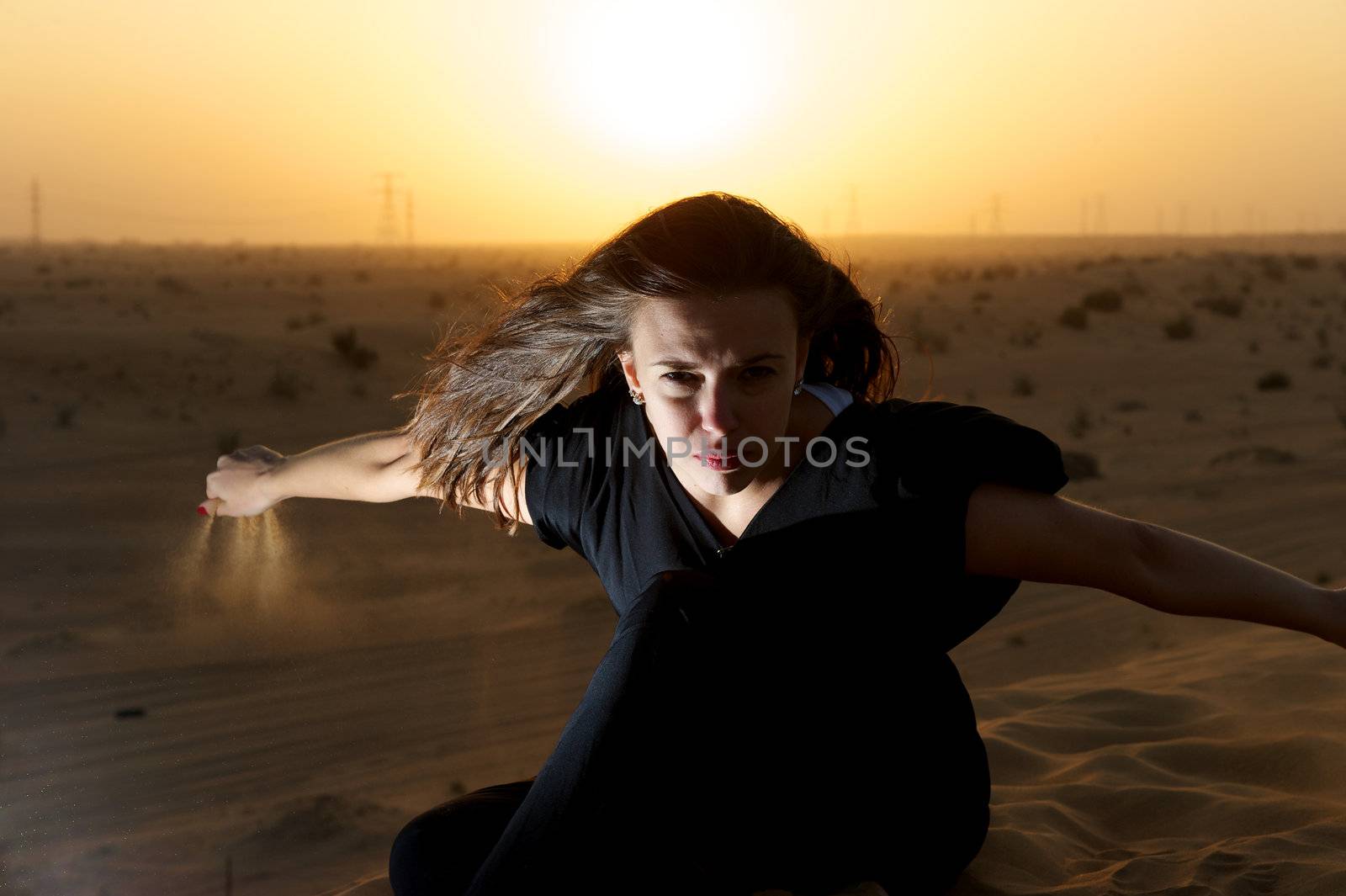 Woman enjoying the desert in Dubai, United Arab Emirates