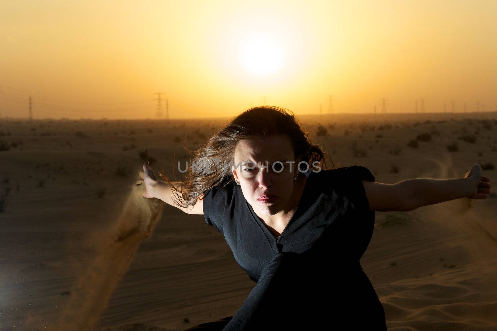 Woman enjoying the desert in Dubai, United Arab Emirates