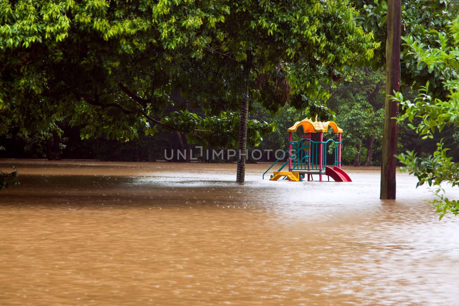 Childrens playground under water after heavy rain and flooding in Queensland Australia