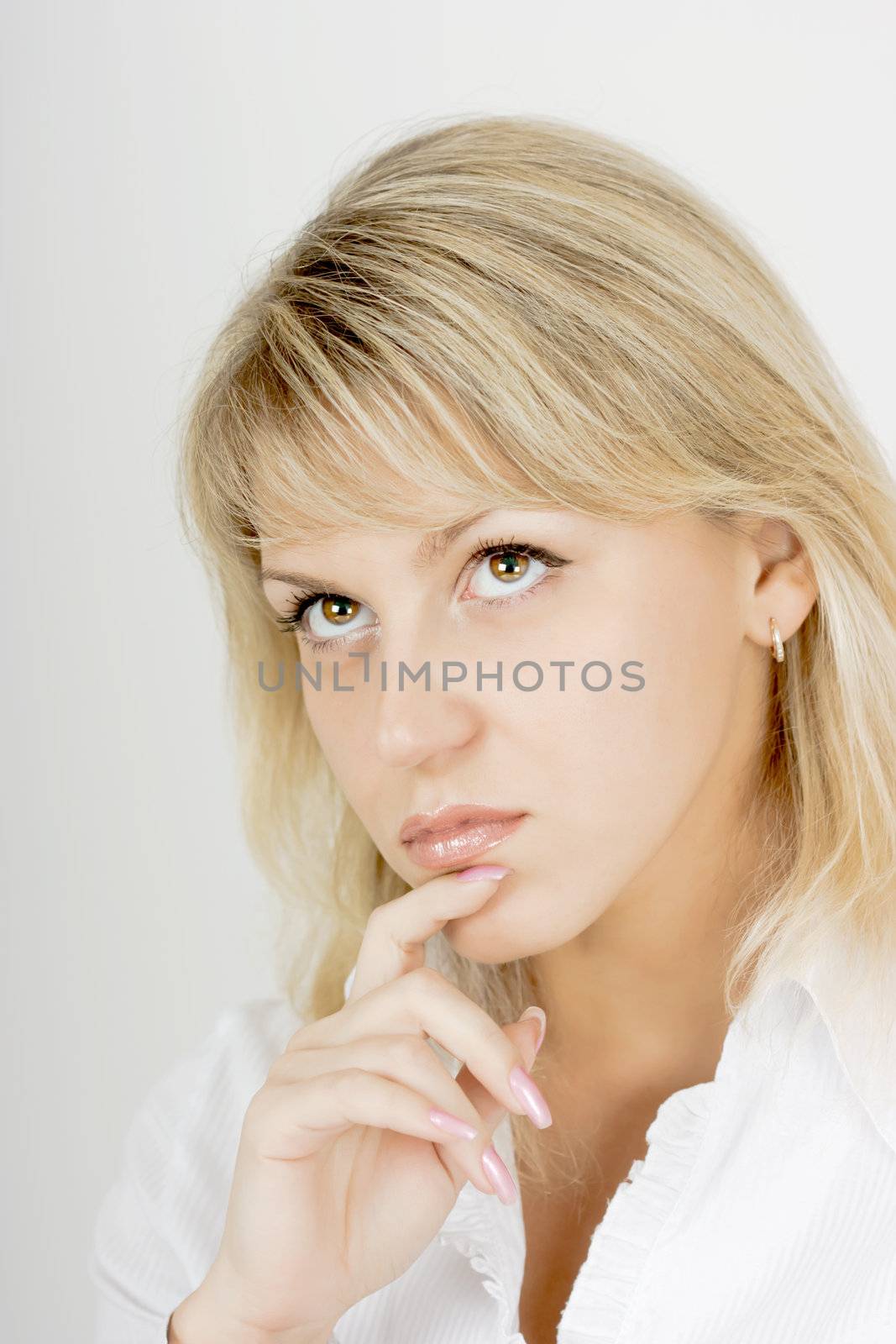 portrait of a pensive girl attractive blonde with hazel eyes
