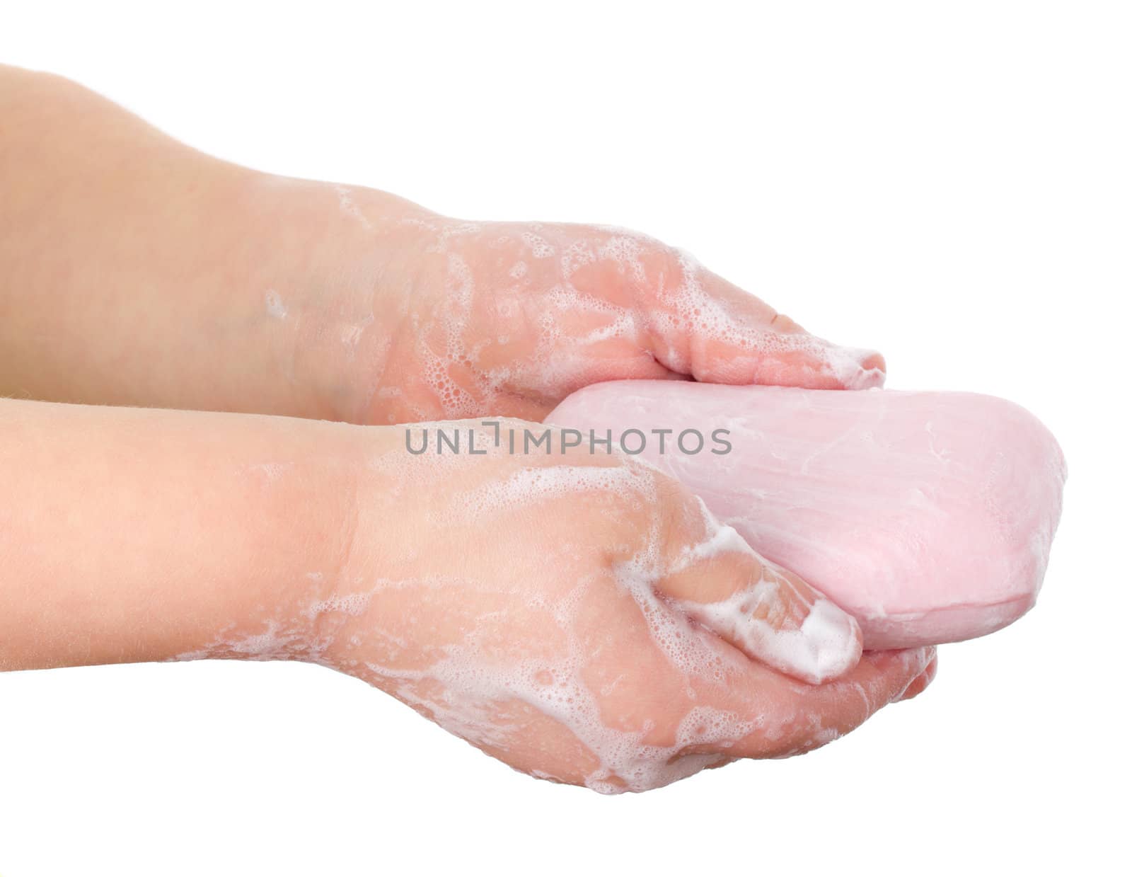 toilet soap in child's hands, isolated on white