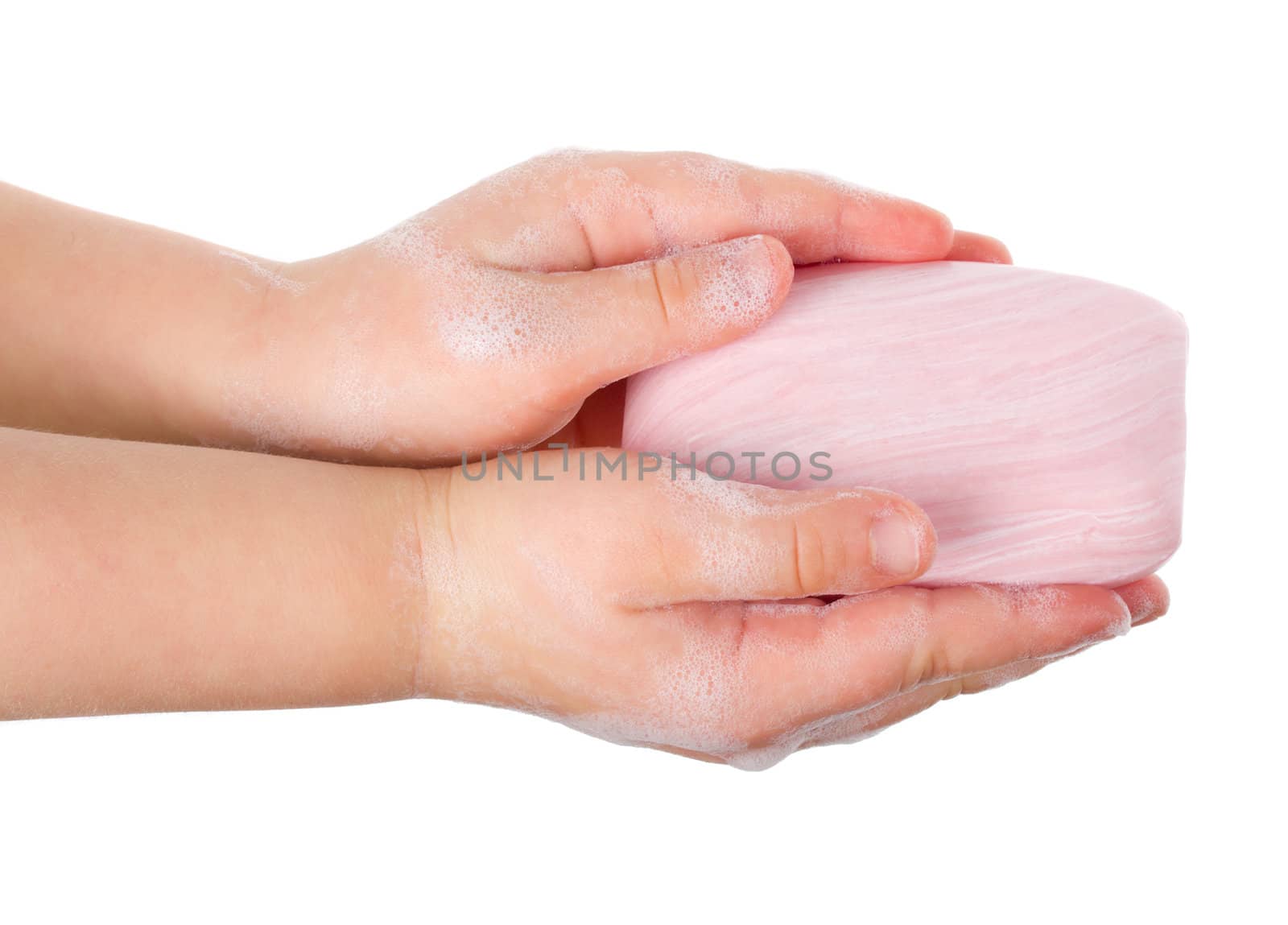 toilet soap in child's hands, isolated on white