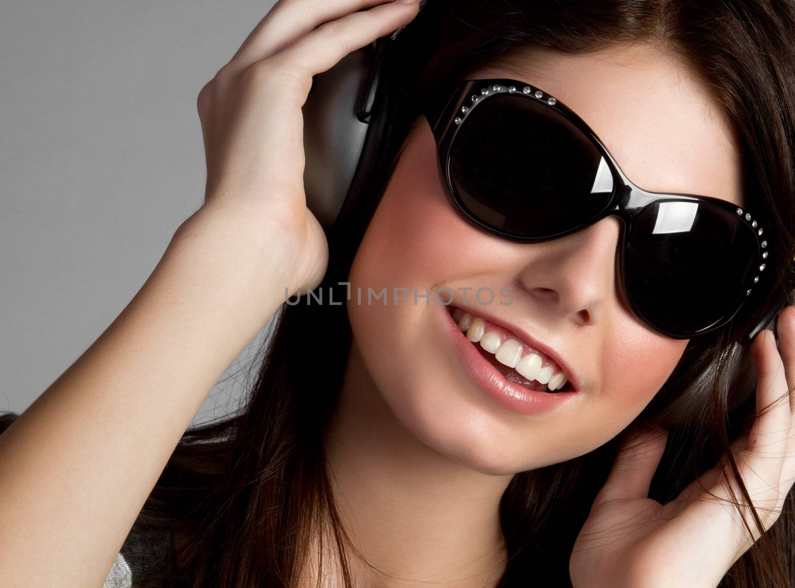 Headphones music girl wearing sunglasses
