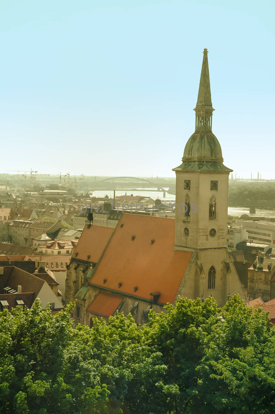 View on a Saint Martin's Church in Bratislava, Apollo bridge in distance
