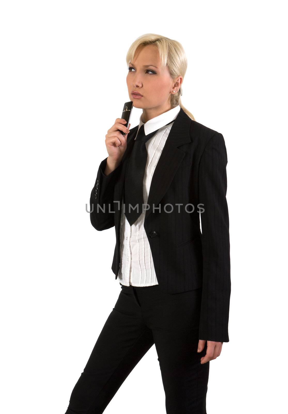 Thoughtful blonde in a business suit with a mobile phone on a white background.