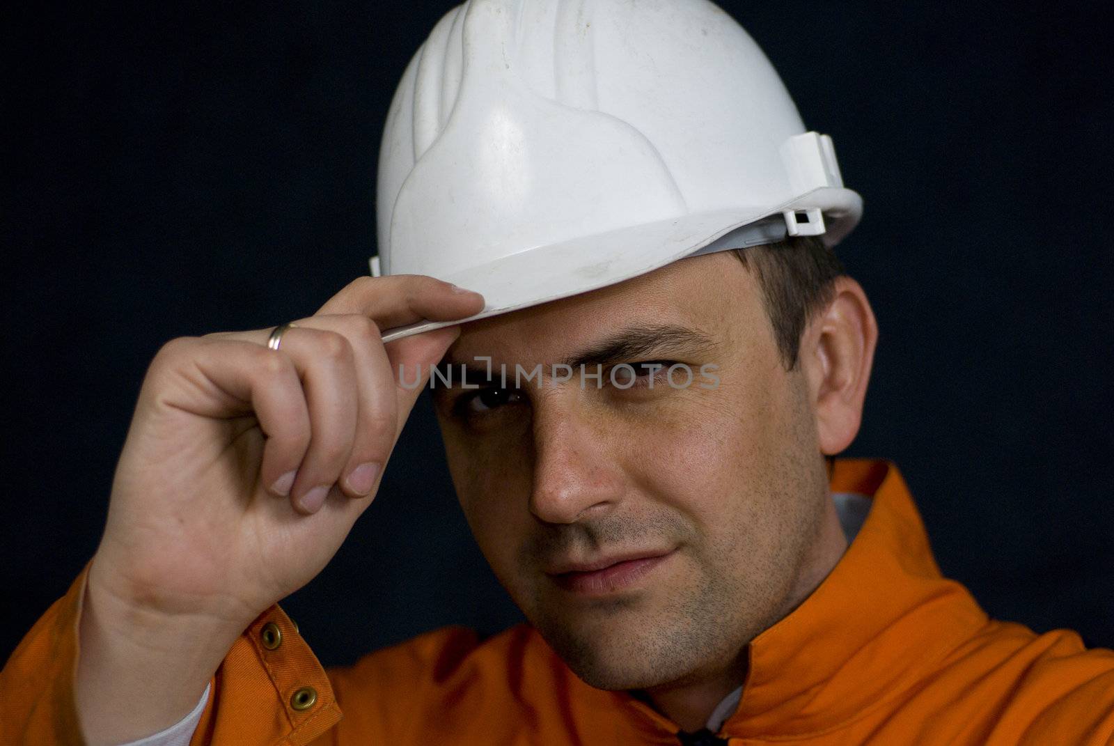Miner saluting with his hardhat stock photo