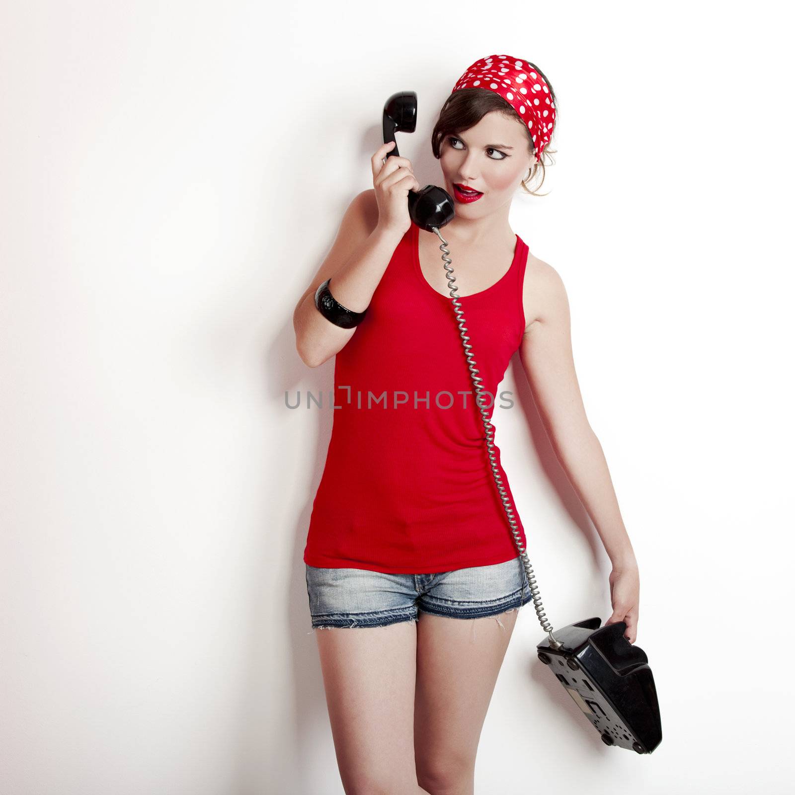 Girl with a vintage phone by Iko