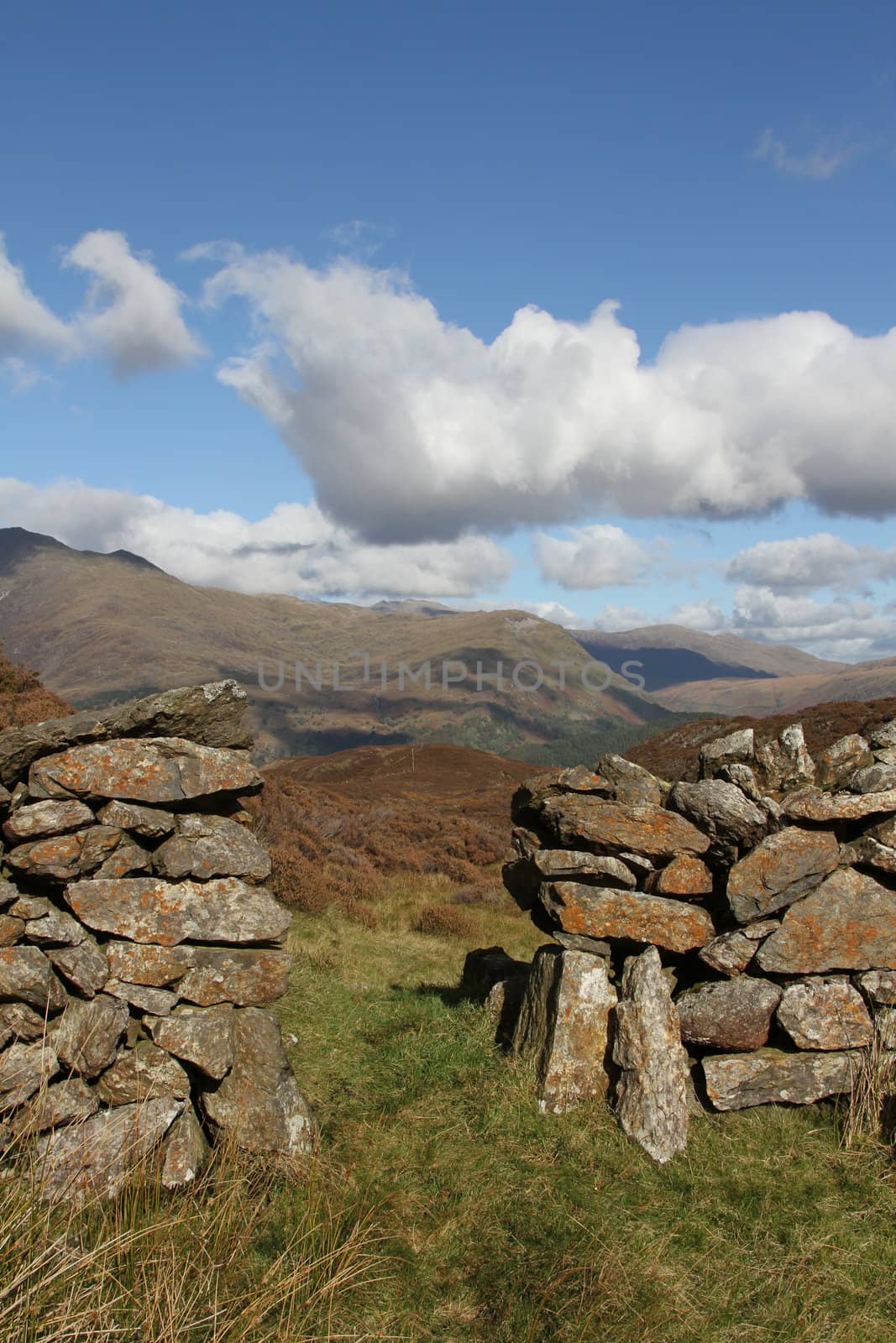 Traditional dry stone wall provides access to national park land.