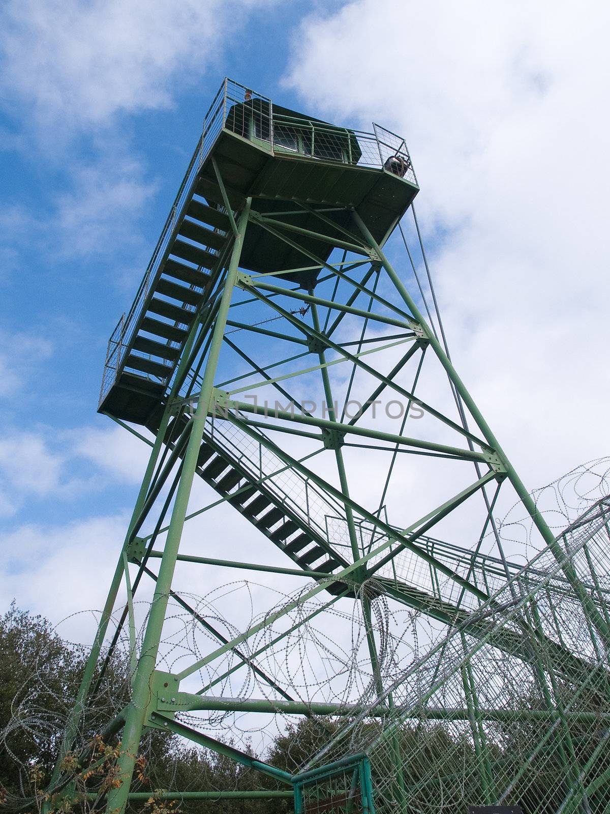 Fire guard prison watch tower vertical image with sky background