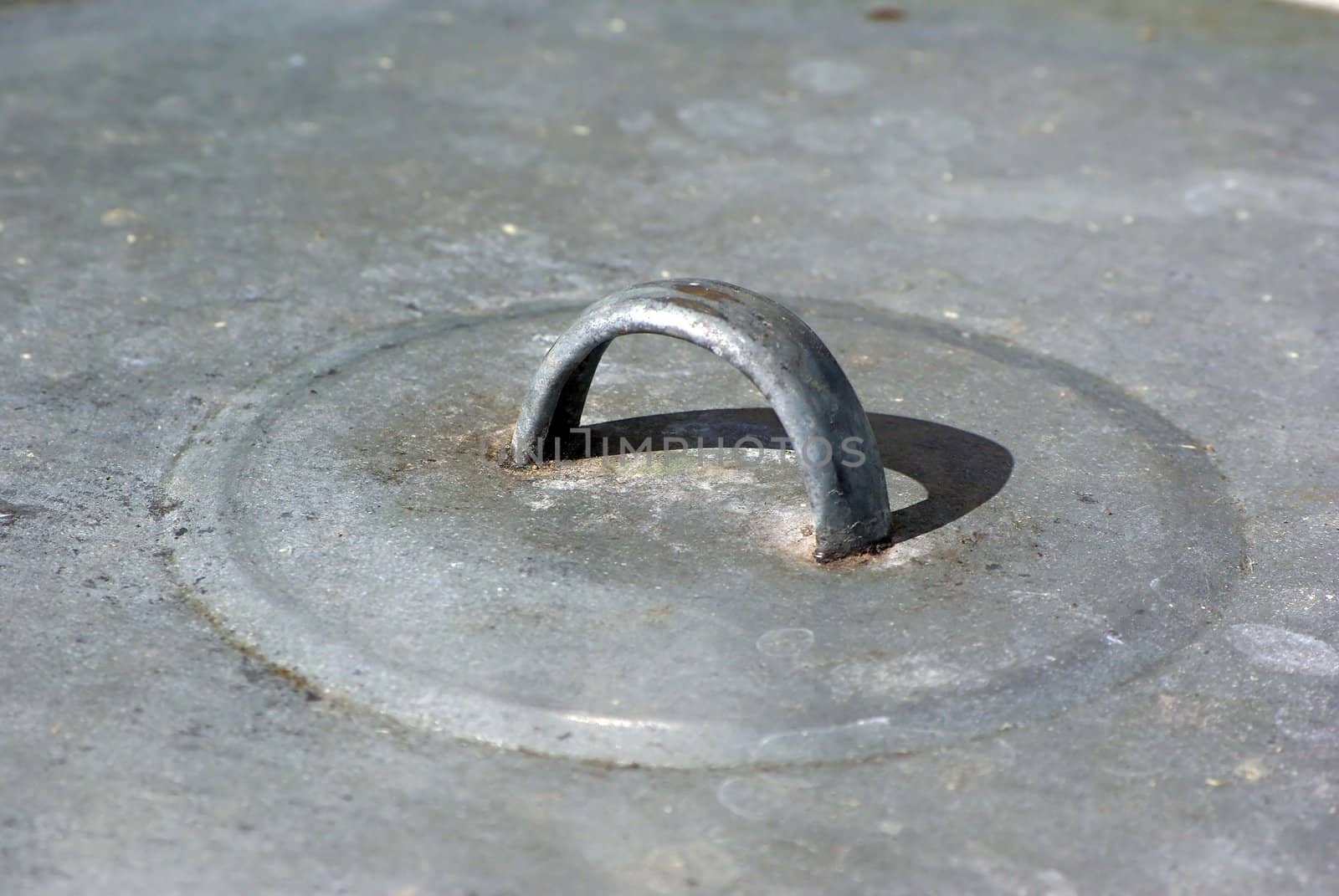 Iron cover of  tank with handle closeup