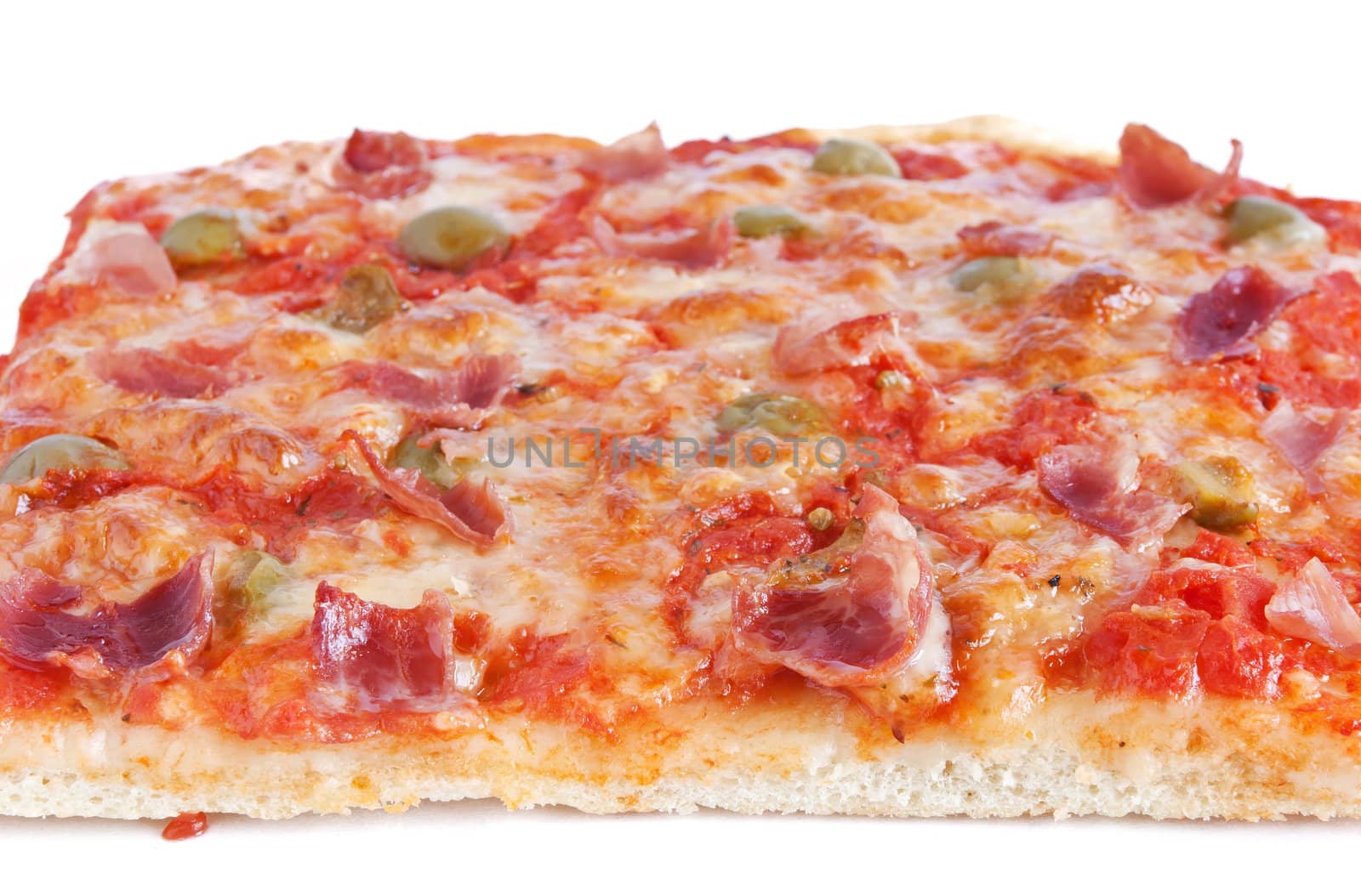 sliced pizza with mozzarella, tomatoes, olives and ham