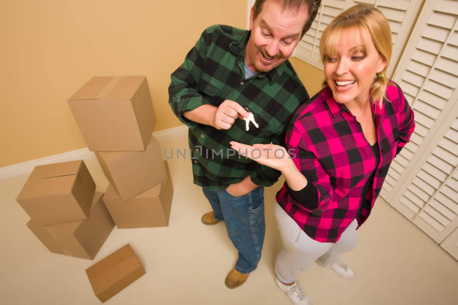 Goofy Excited Man Handing Keys to Smiling Wife by Feverpitched