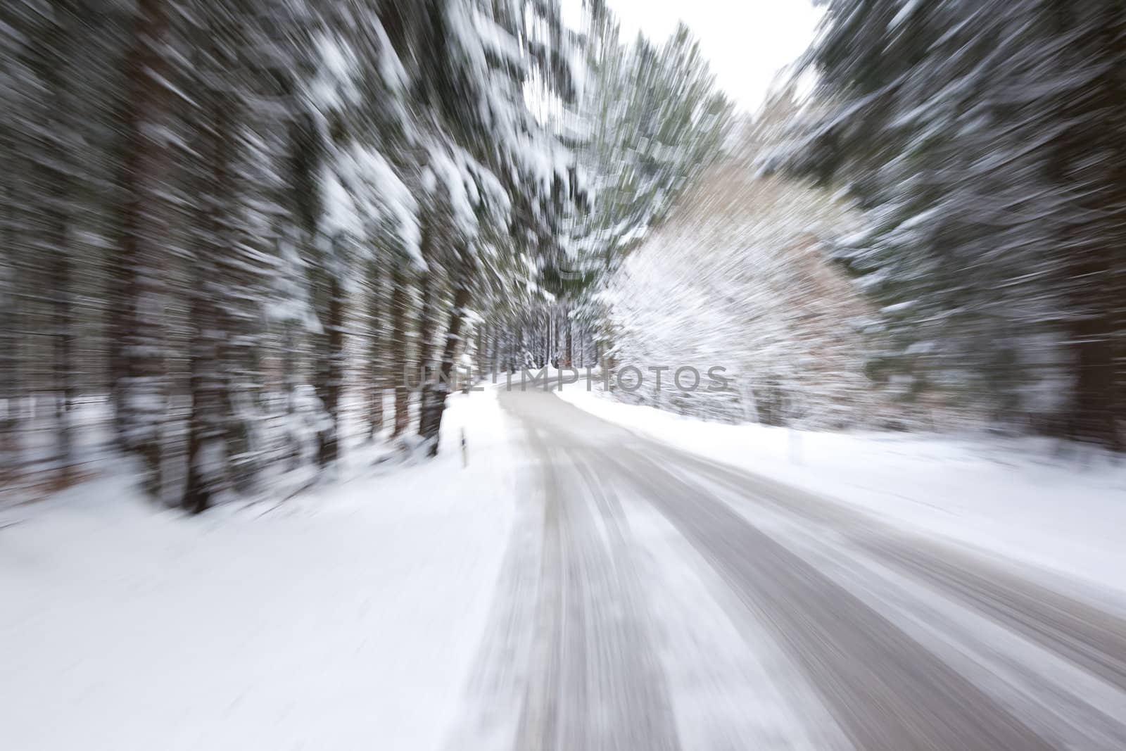 An image of a deep winter snowy road with a zoom