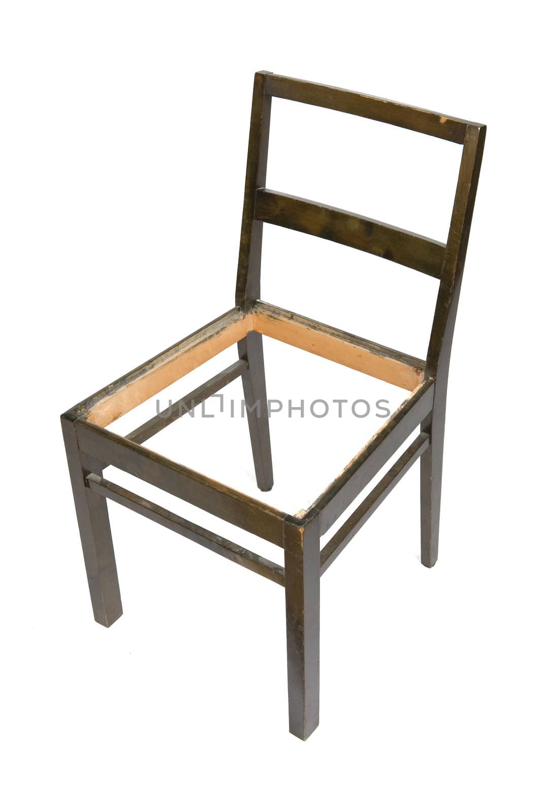 Old chair in need of restoration isolated on a white background