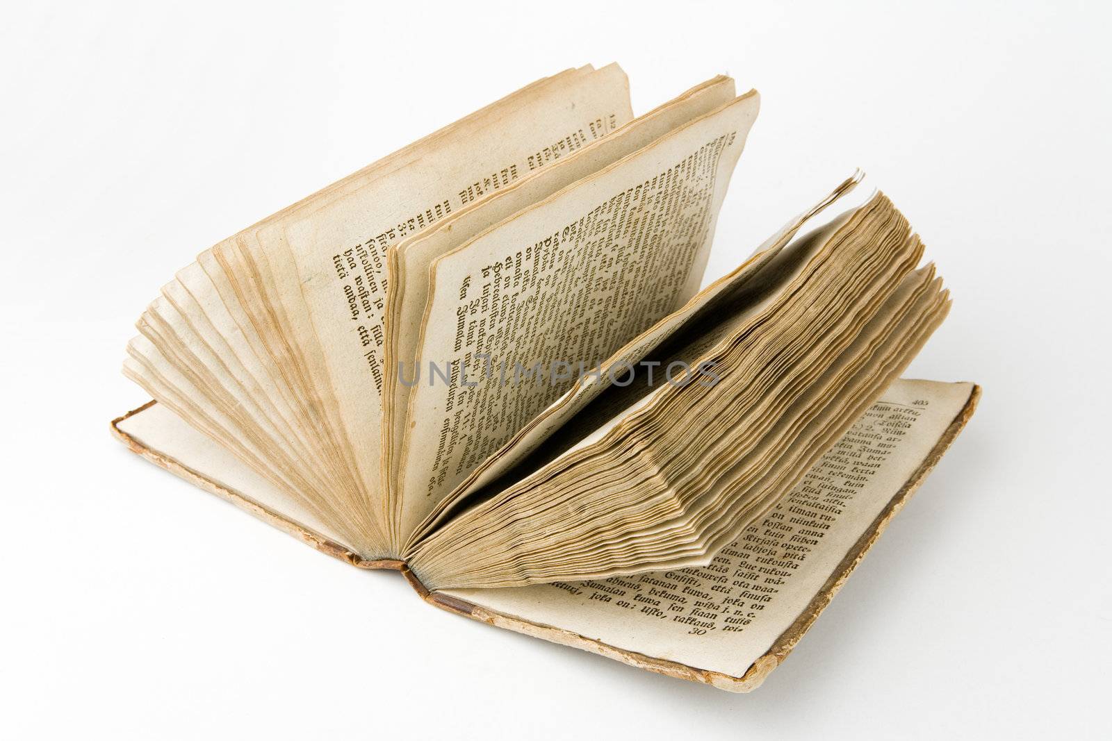 Open antique book on a white background