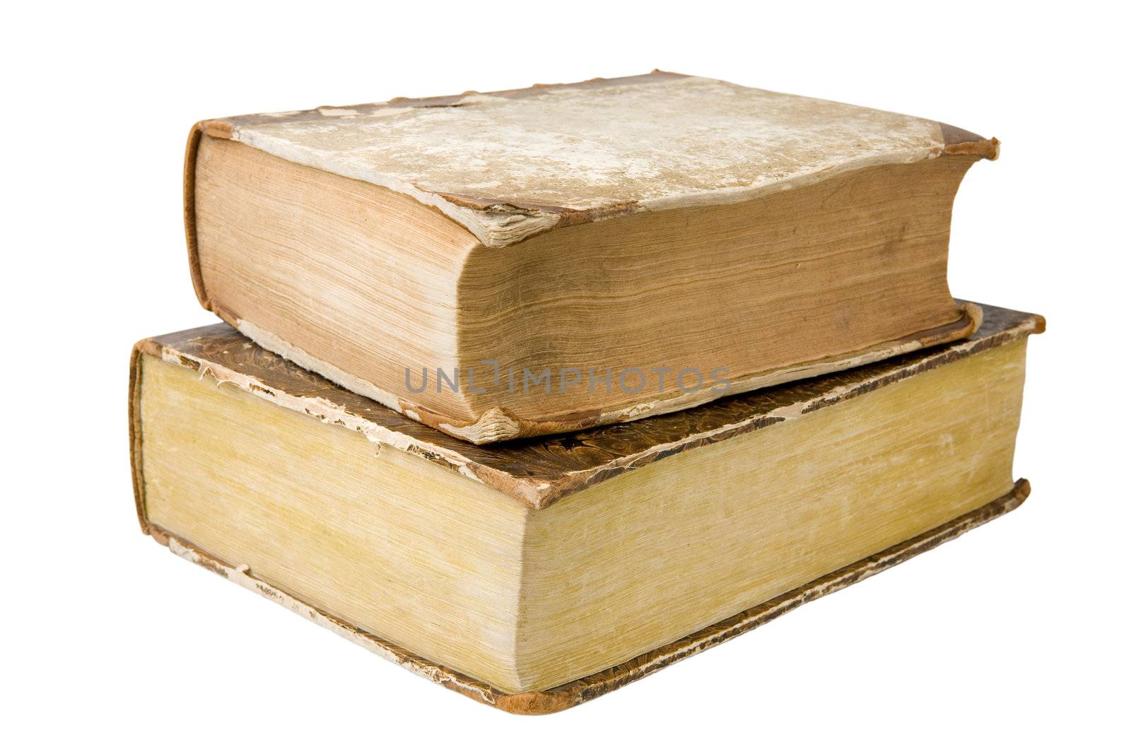 Two thick antique books isolated on a white background