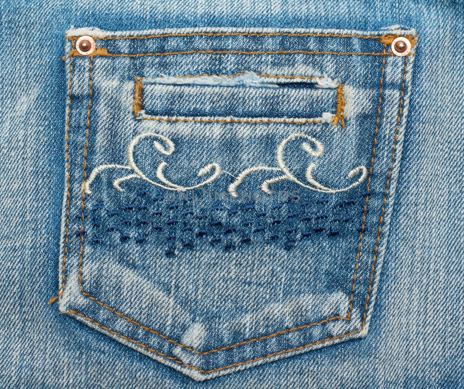 Jeans pocket, embroider pattern on fabrics, rivets and sewing seams