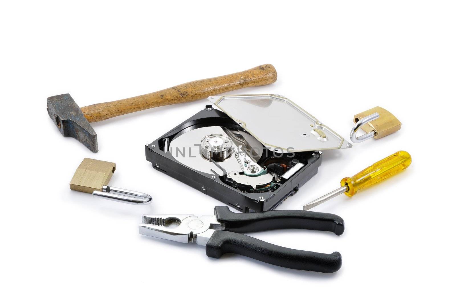 Hard disk protection broken on a white background with two padlocks and some tools