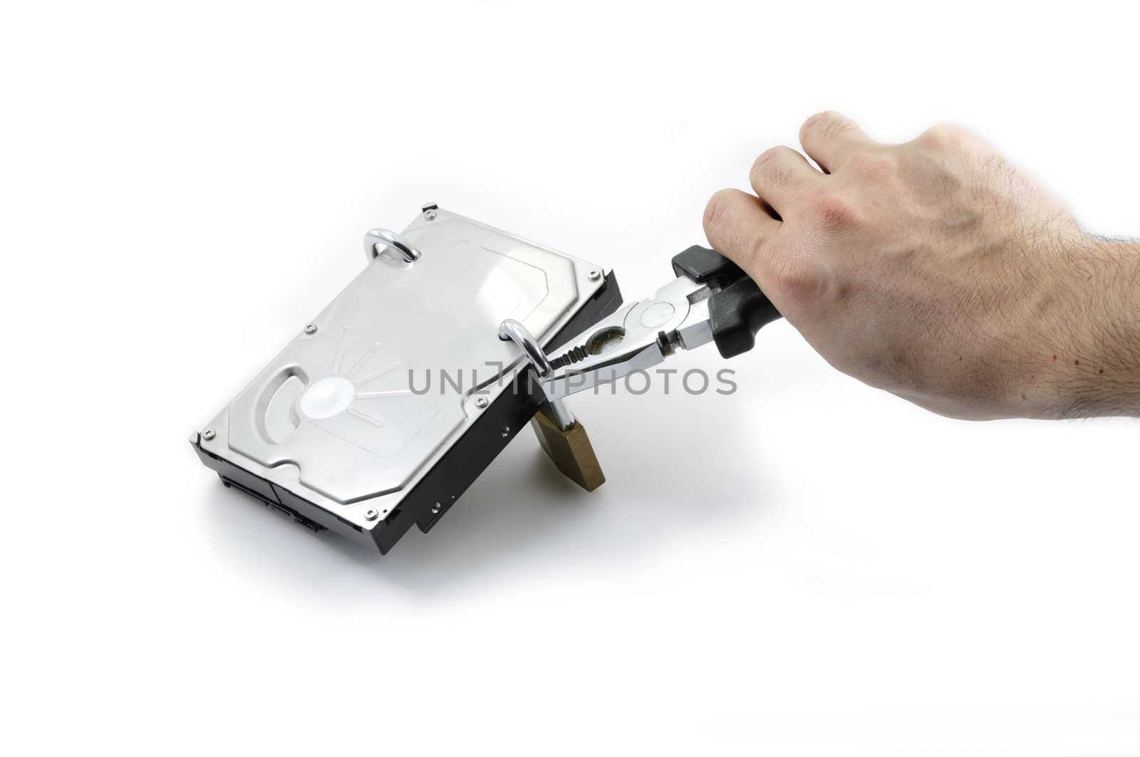 Hard disk protected under attack by one hand with pliers on a white background