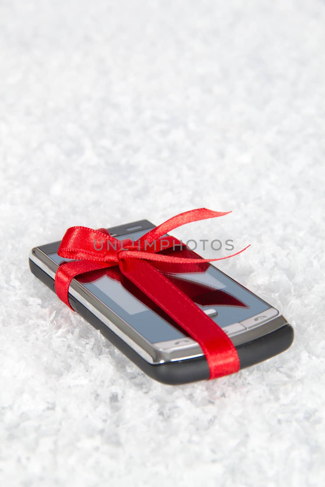 Mobile phone in a gift by a holiday