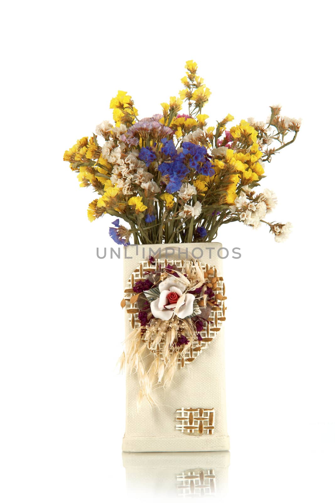 Bouquet flowers in a vase on a white background