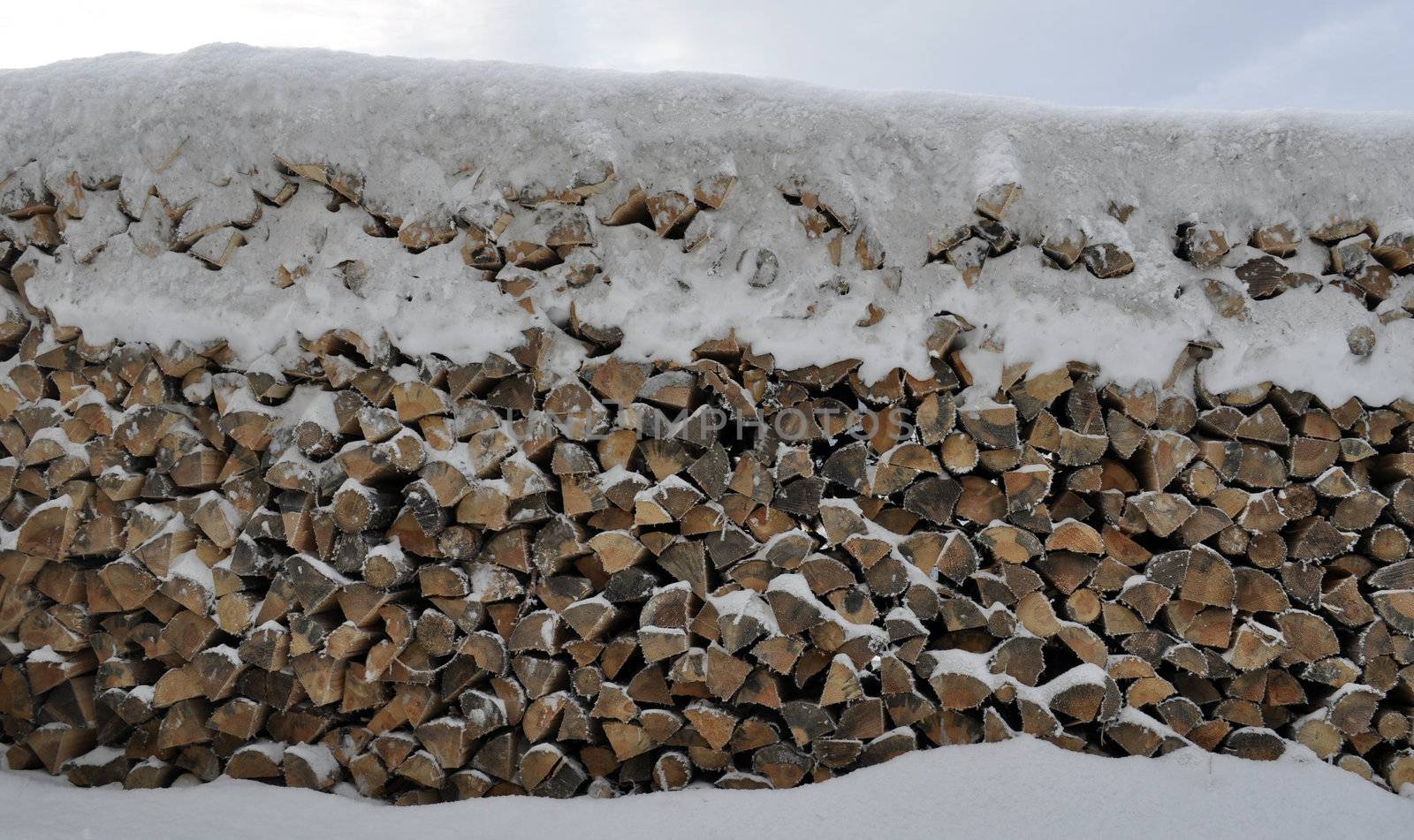 a wooden stable in the winter