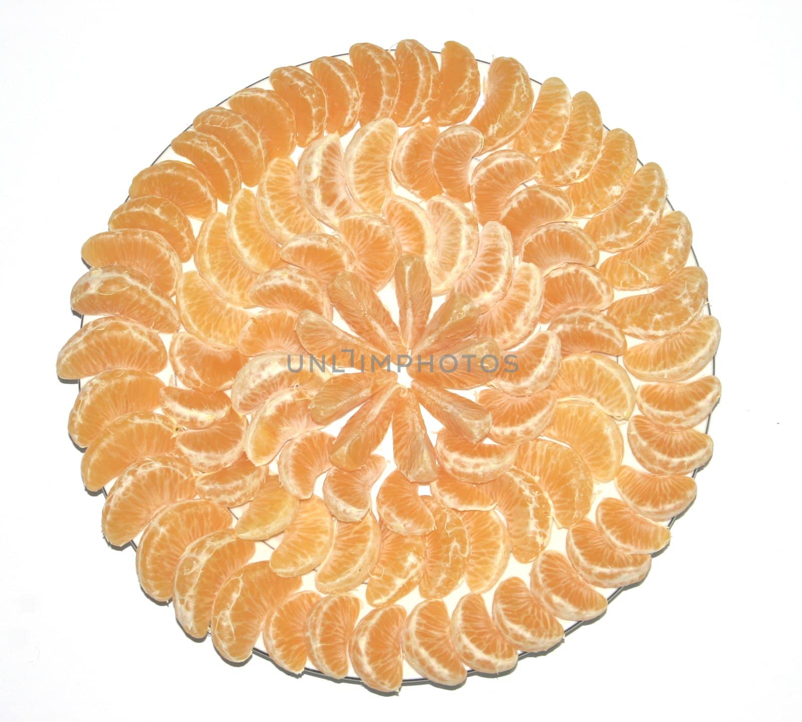 Sweet, orange tangerines on a plate