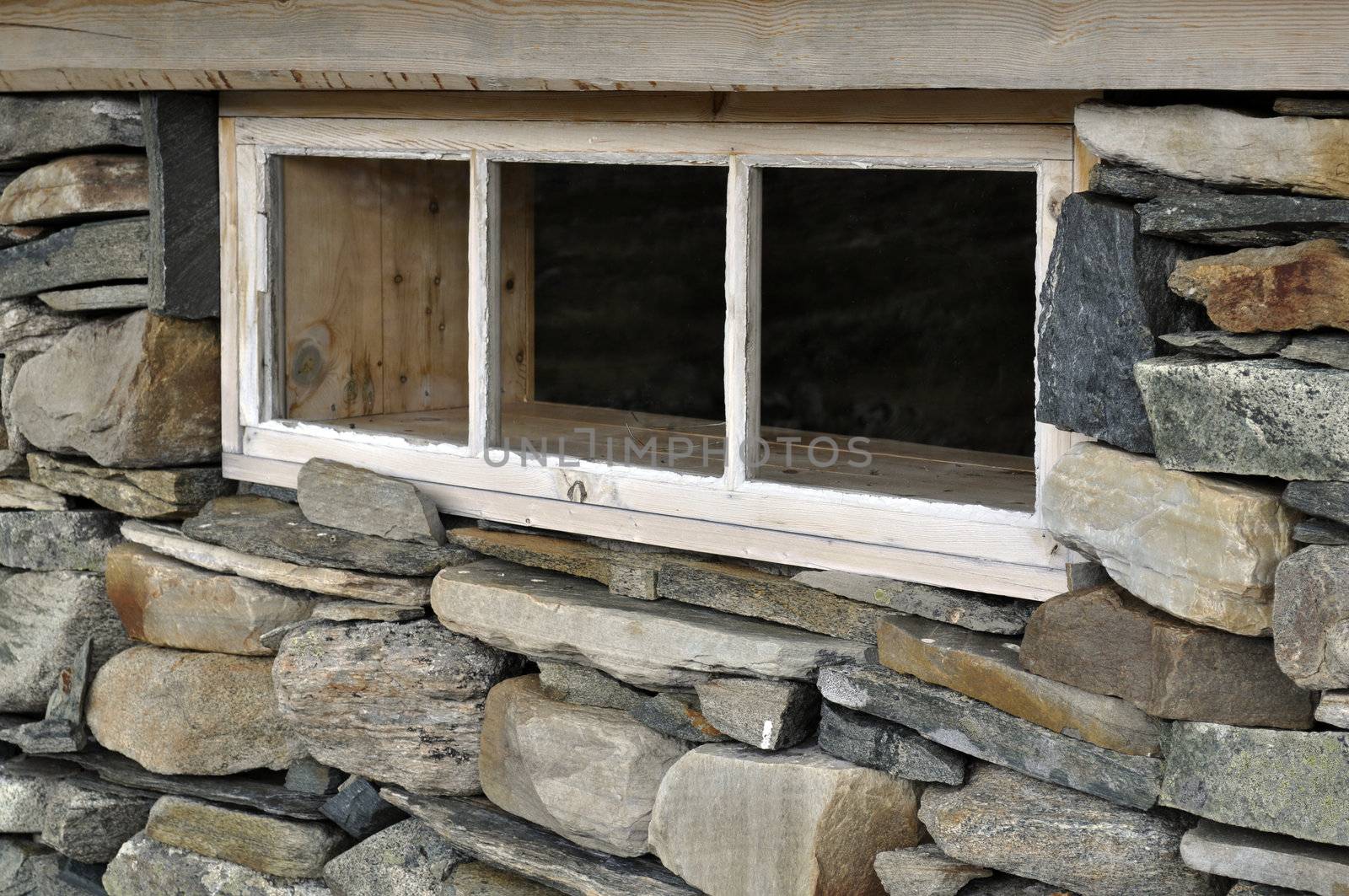 a window in a stone wall