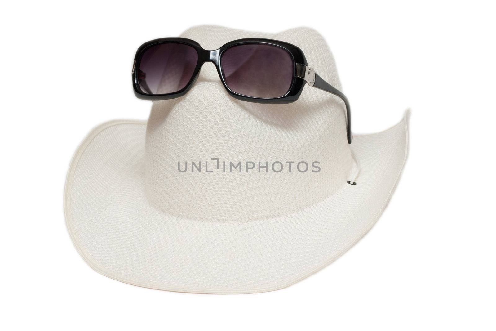 Hat with fields and sunglasses insulated on white background