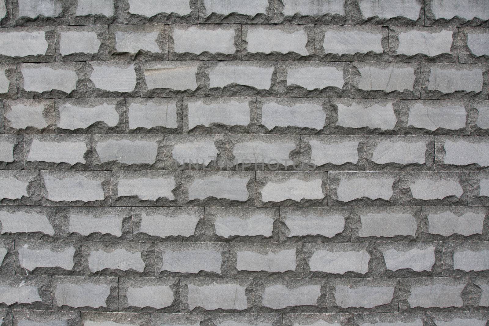 Sulfuric brick wall, marble rows