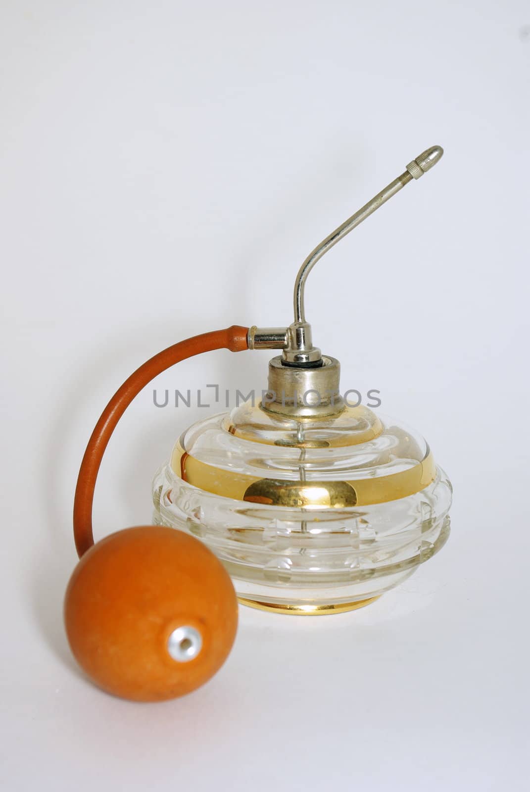 Old glass  perfume container with pulverizer