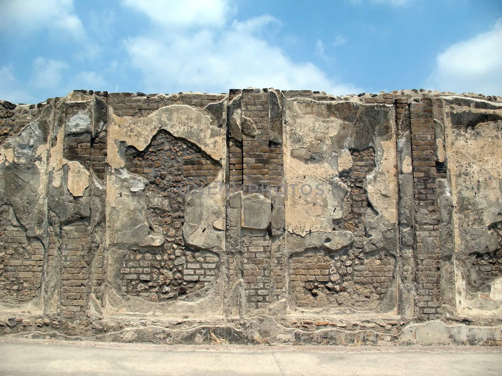 Detail of the ancient ruined wall in Pompei, Italy 