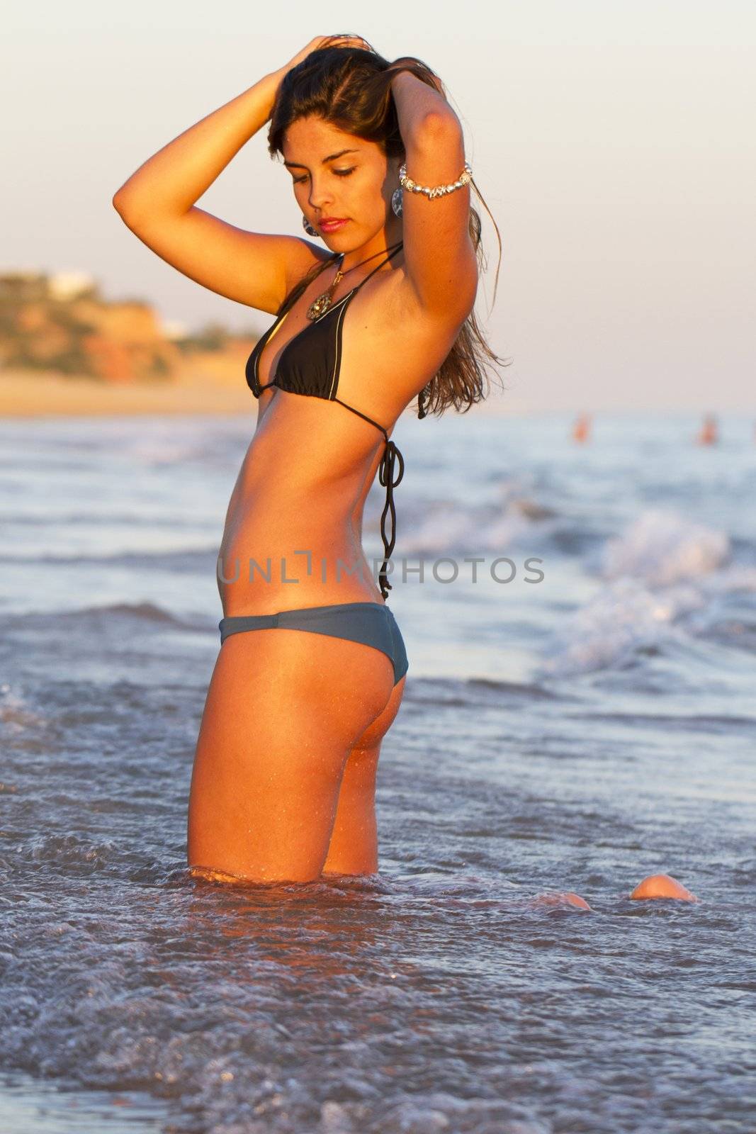beautiful young girl with a bikini by membio