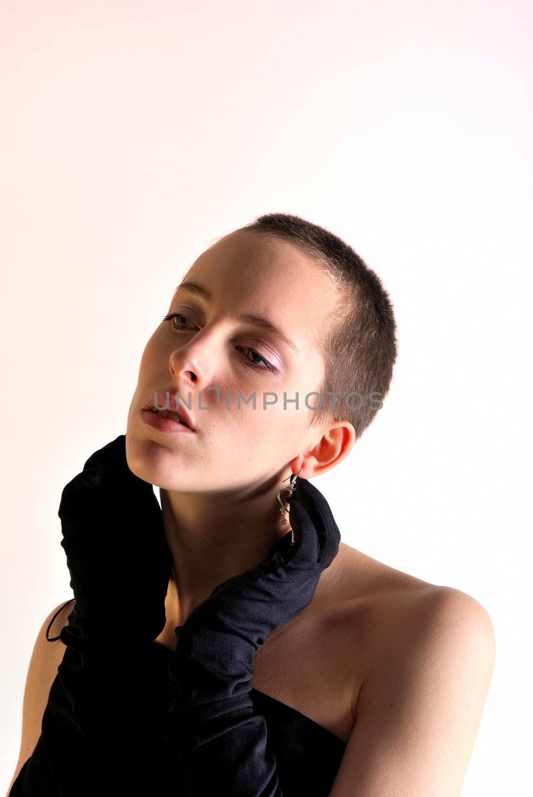 Womans face in black with gloves